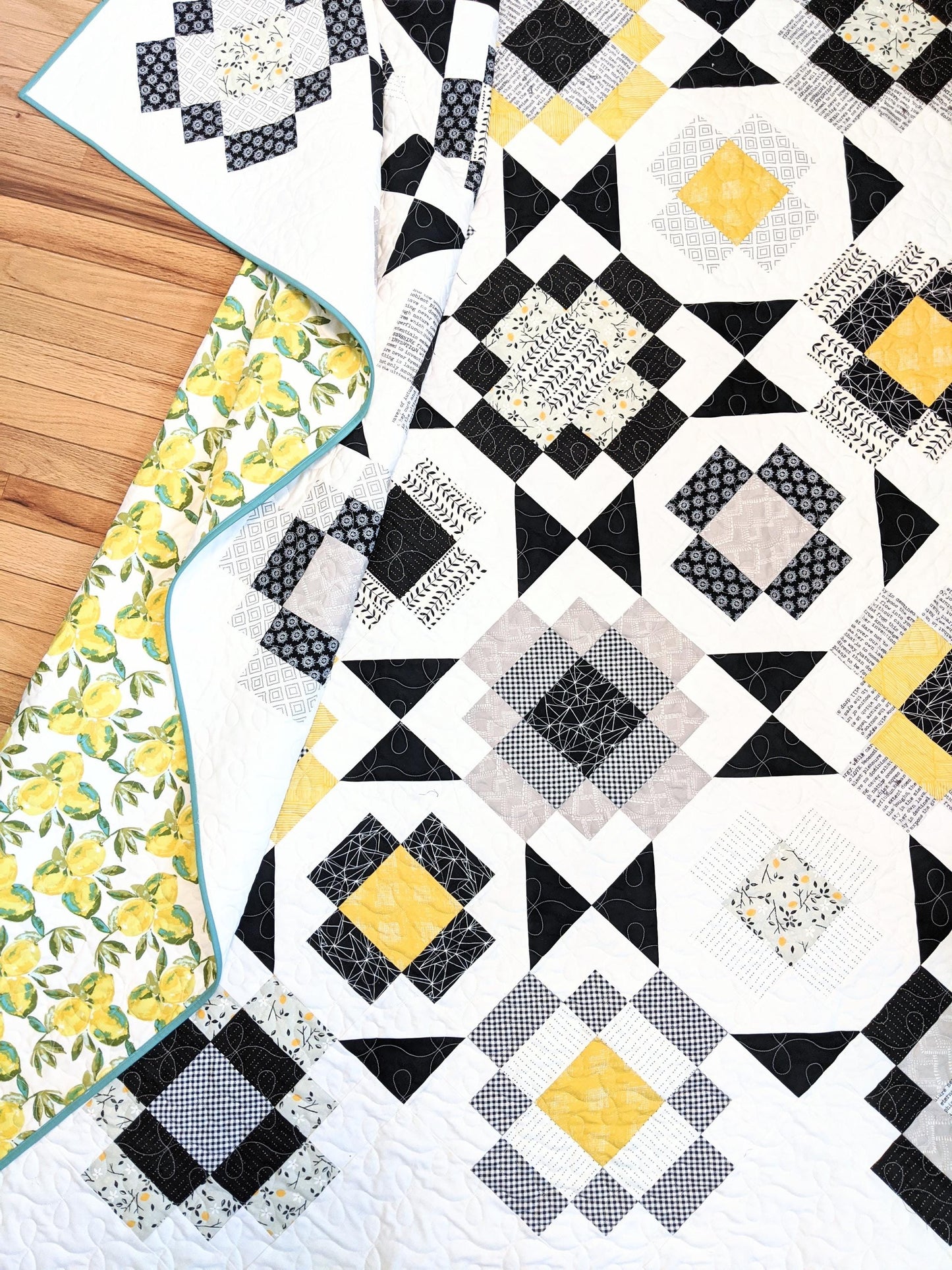Black and yellow twin size patchwork quilt