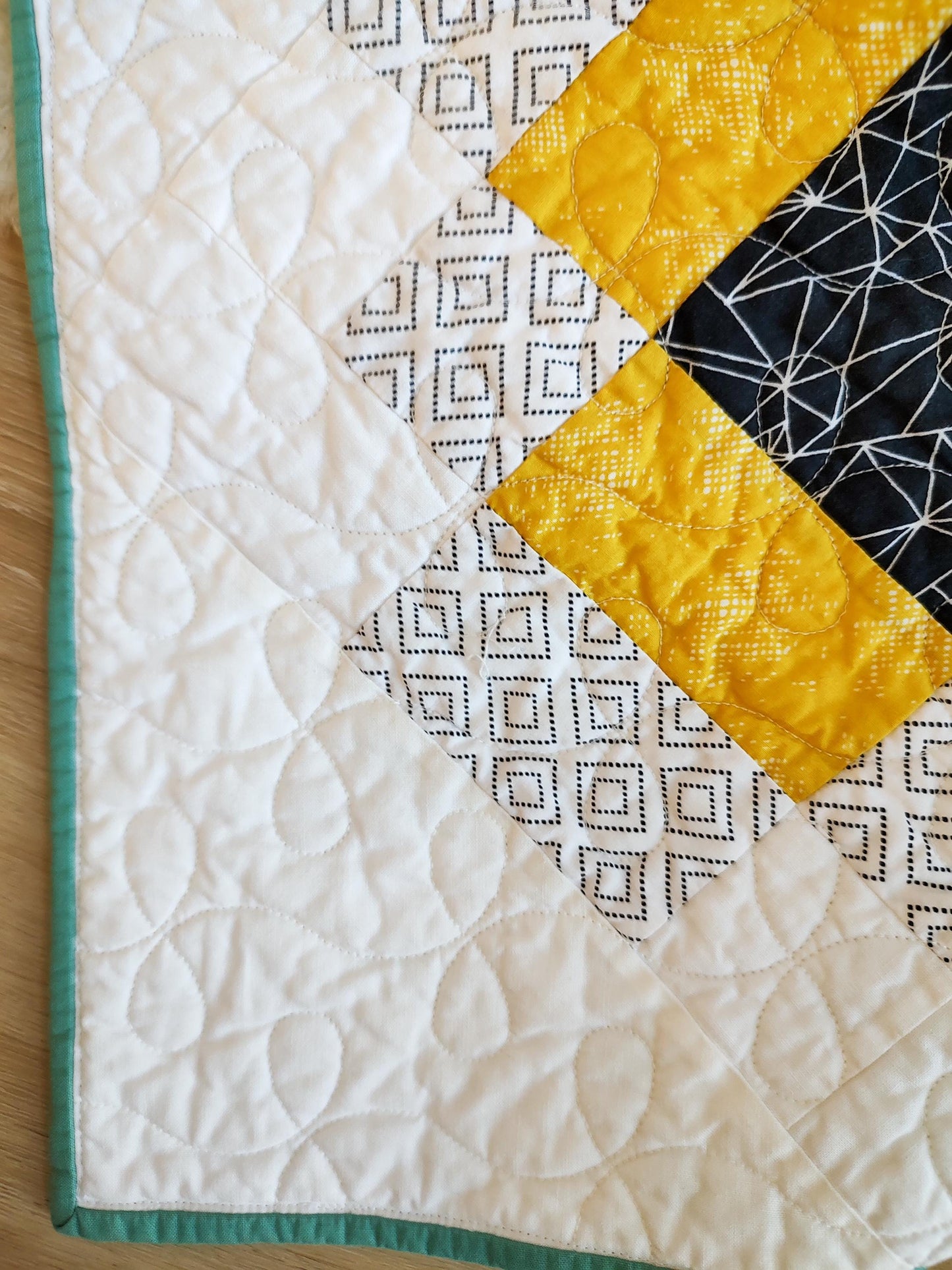 Black and yellow twin size patchwork quilt