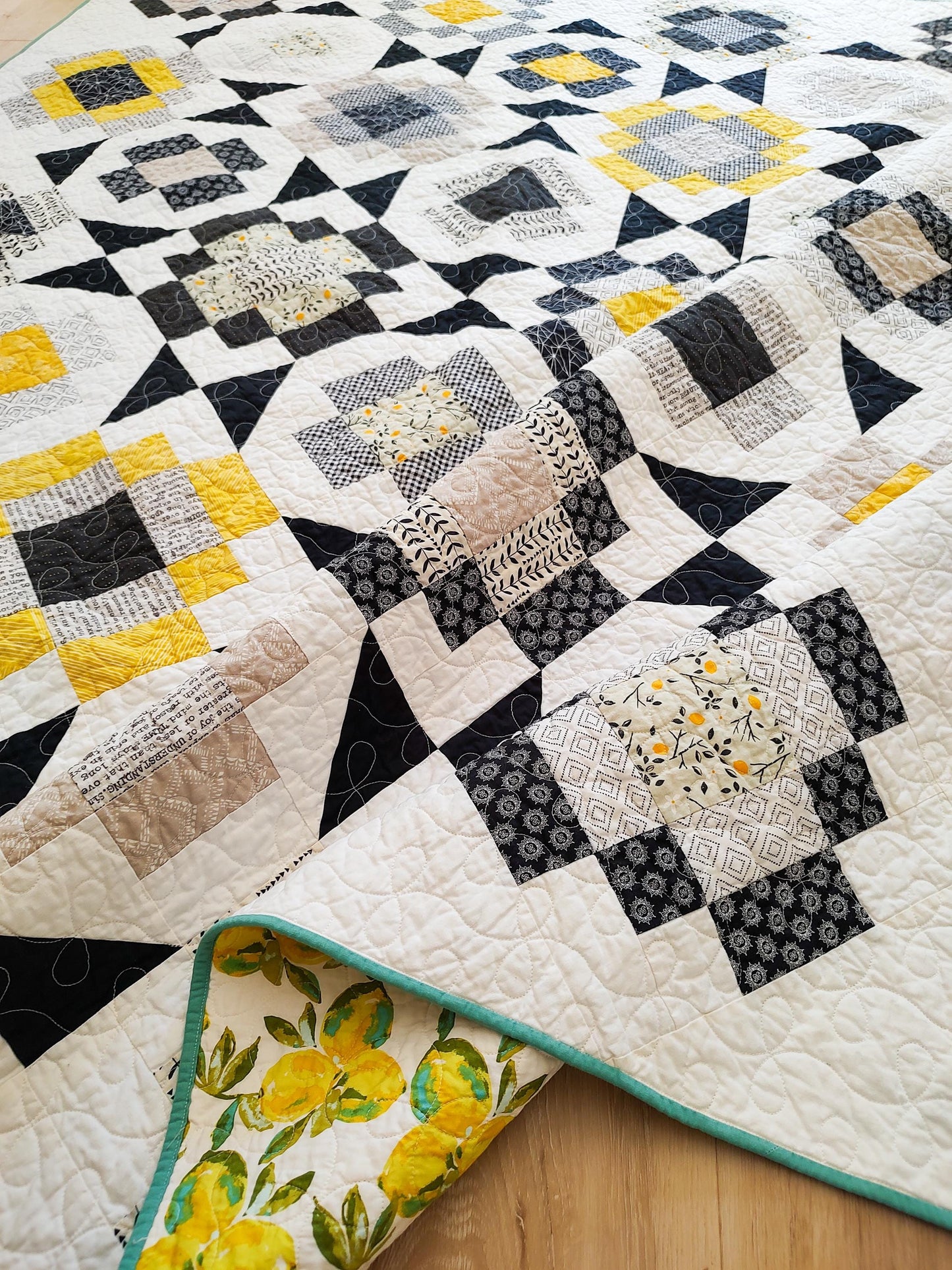 Black and yellow twin size patchwork quilt