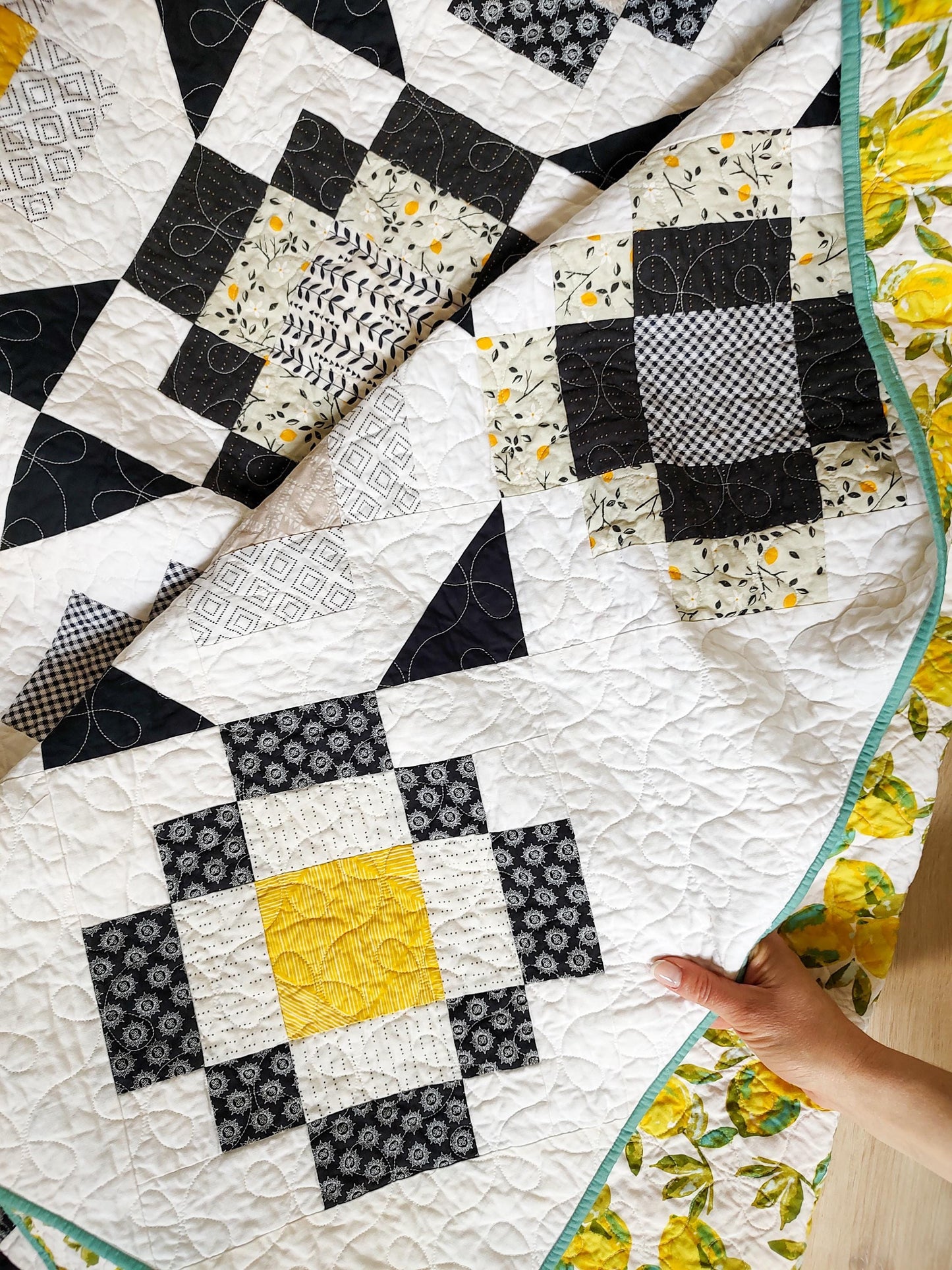 Black and yellow twin size patchwork quilt