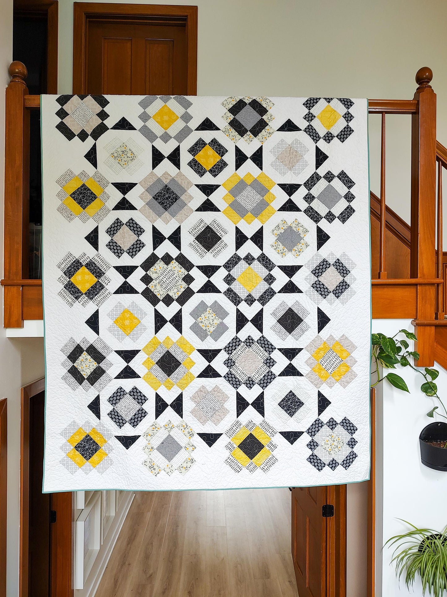 Black and yellow twin size patchwork quilt