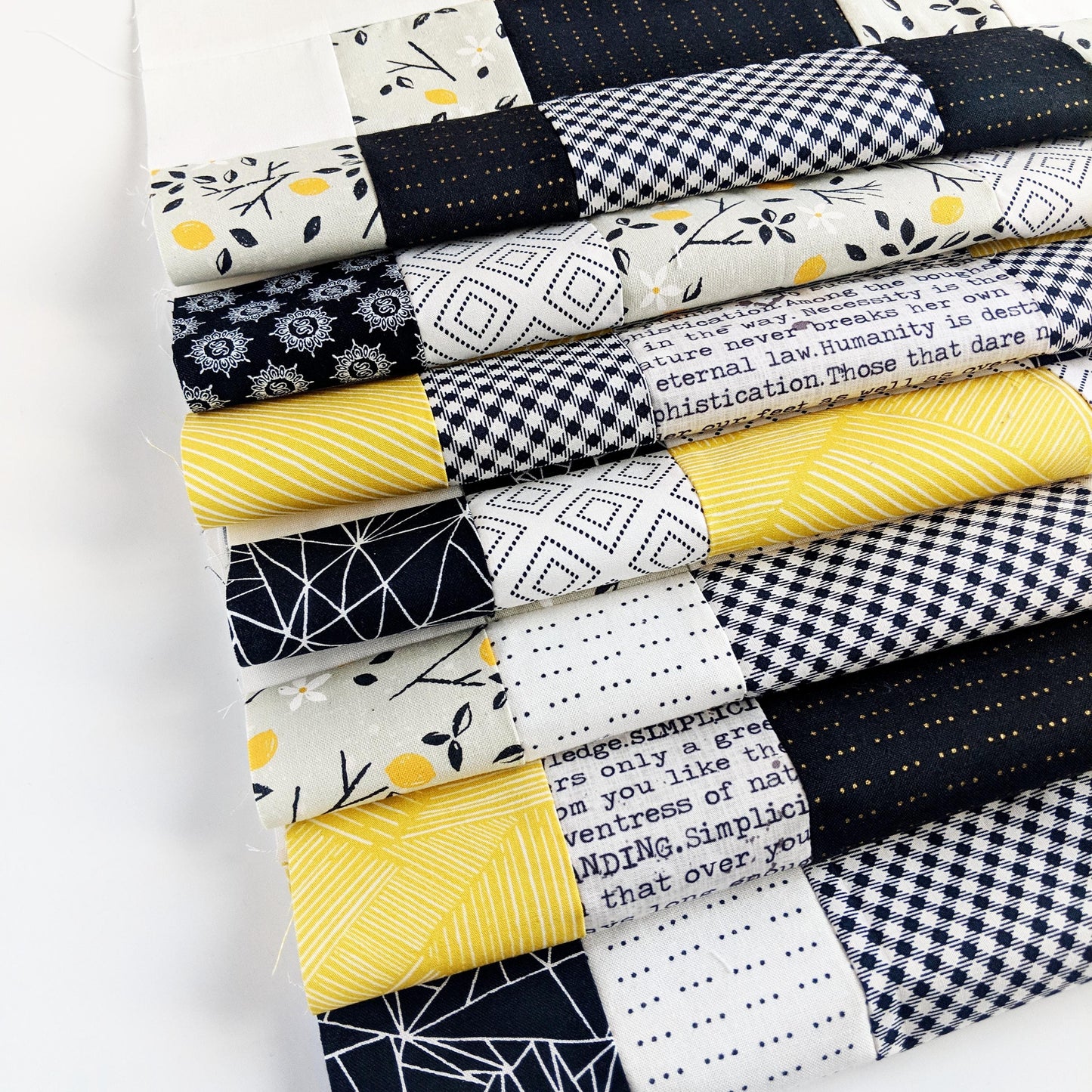 Black and yellow twin size patchwork quilt