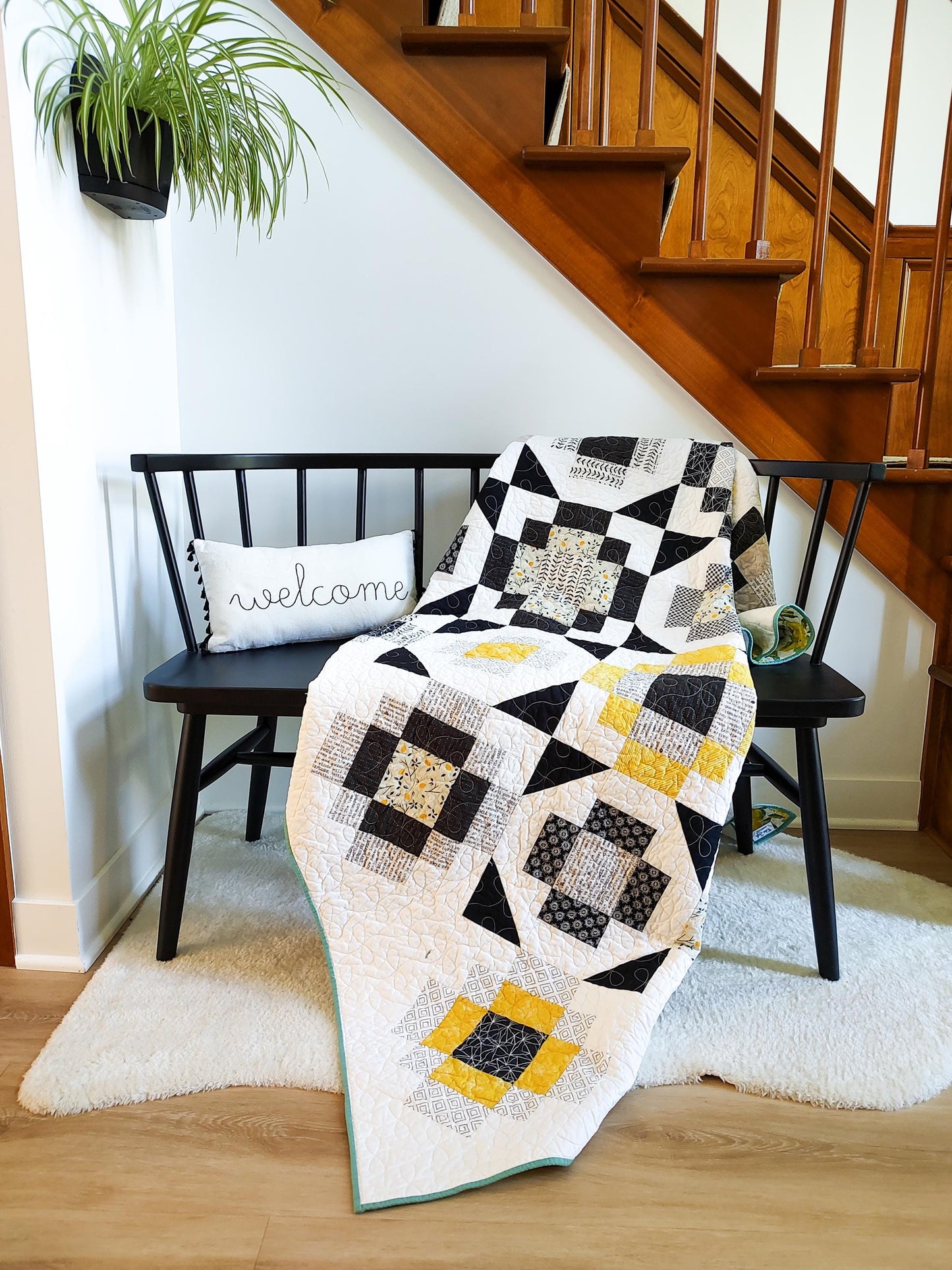 Black and yellow twin size patchwork quilt