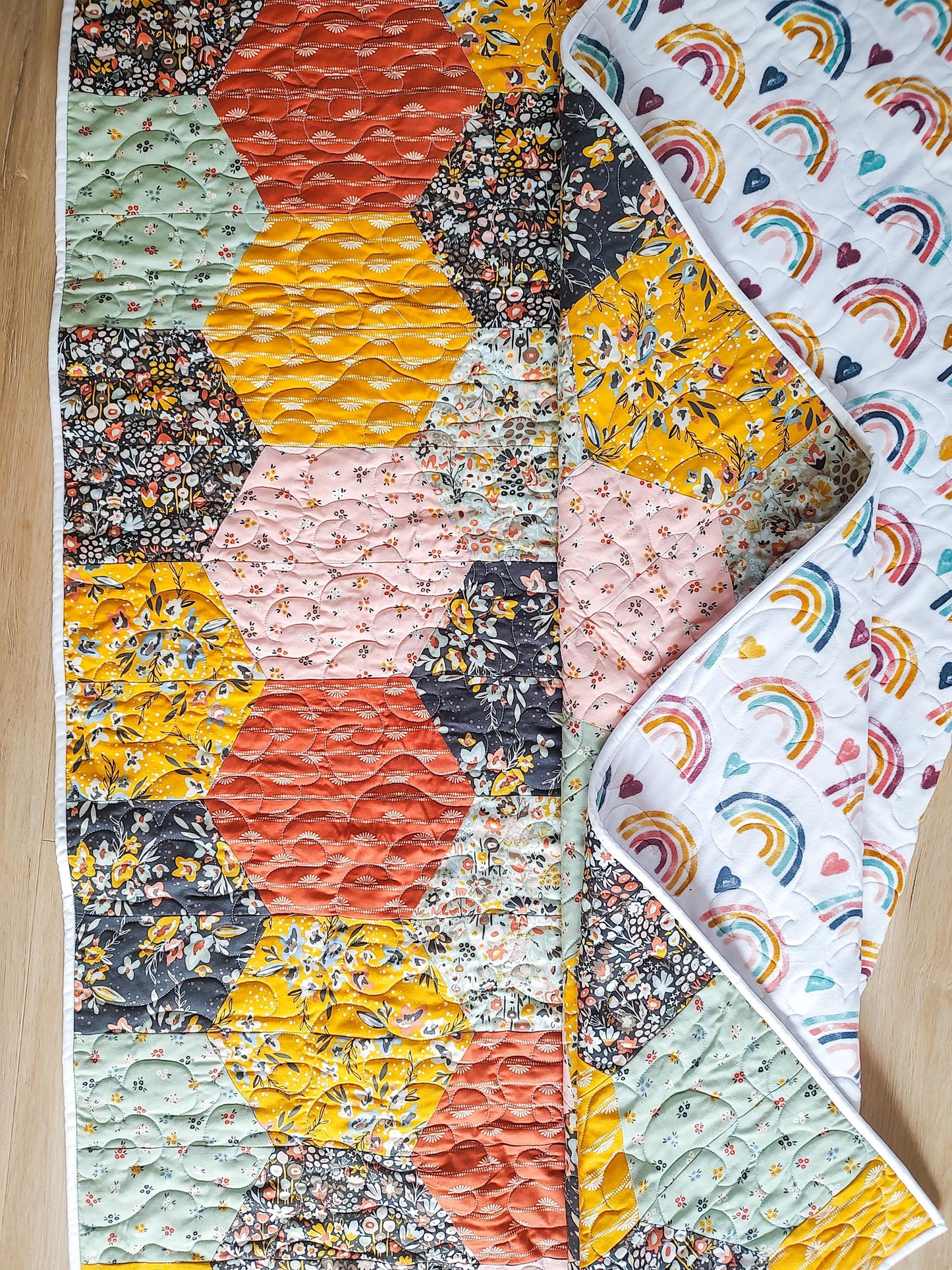 Colorful hexagon throw quilt with minky back