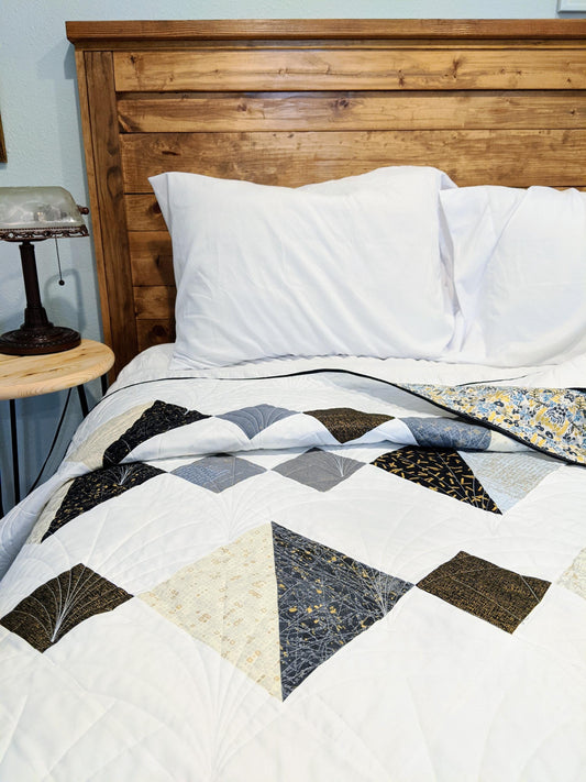 Modern black and gold twin size patchwork quilt